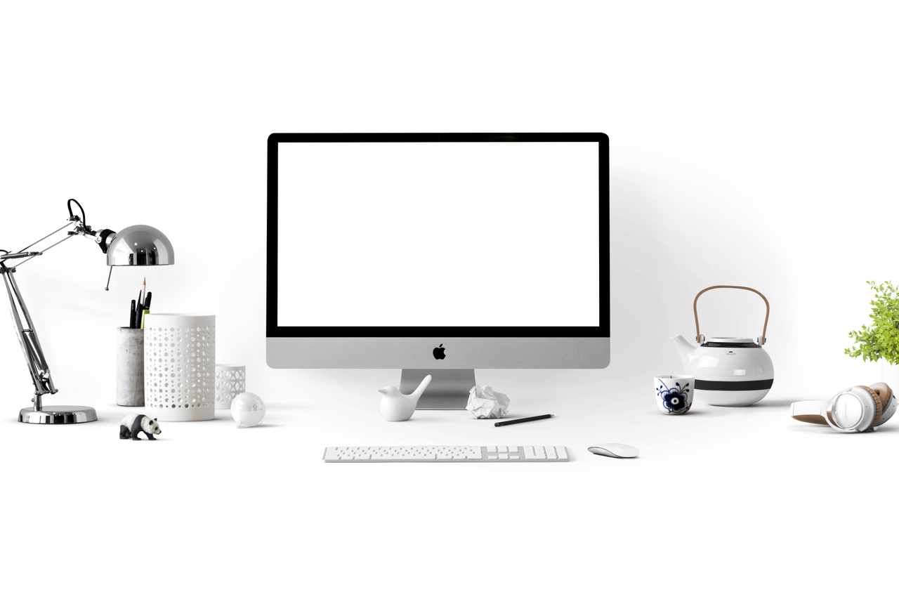 about-img-01 Minimalist office desk with an iMac, lamp, and stationery, ideal for tech-themed backgrounds.